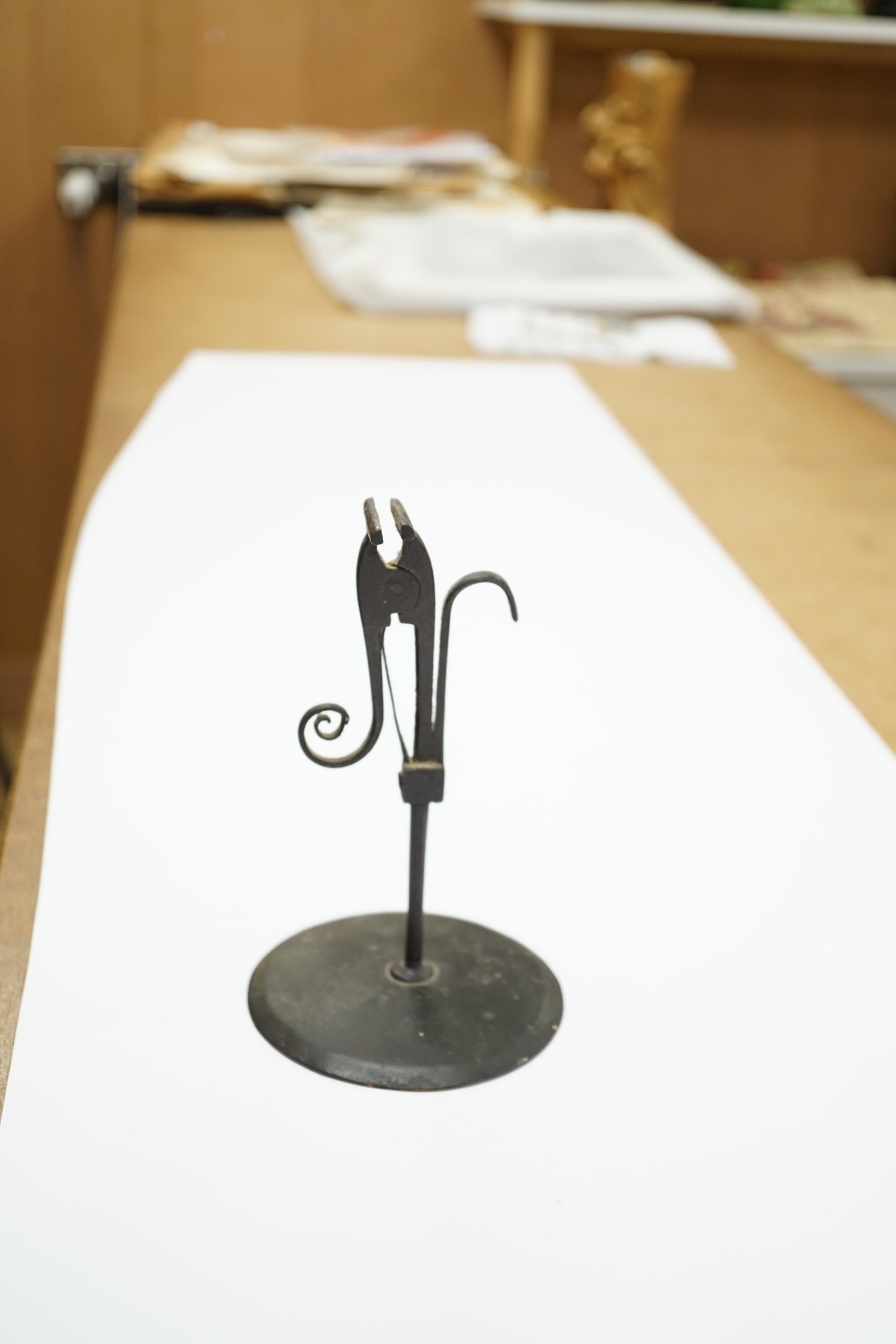 A late 18th century rush light, 15.5cm high